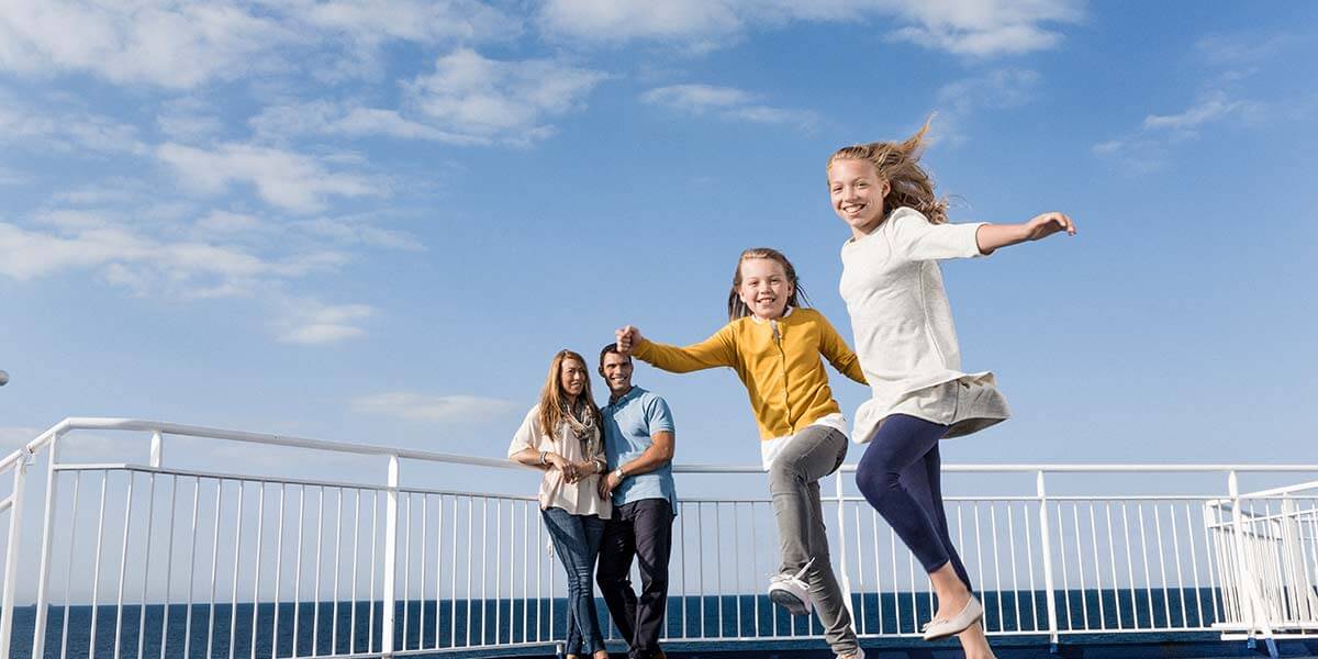 Family on deck onboard Dover-France